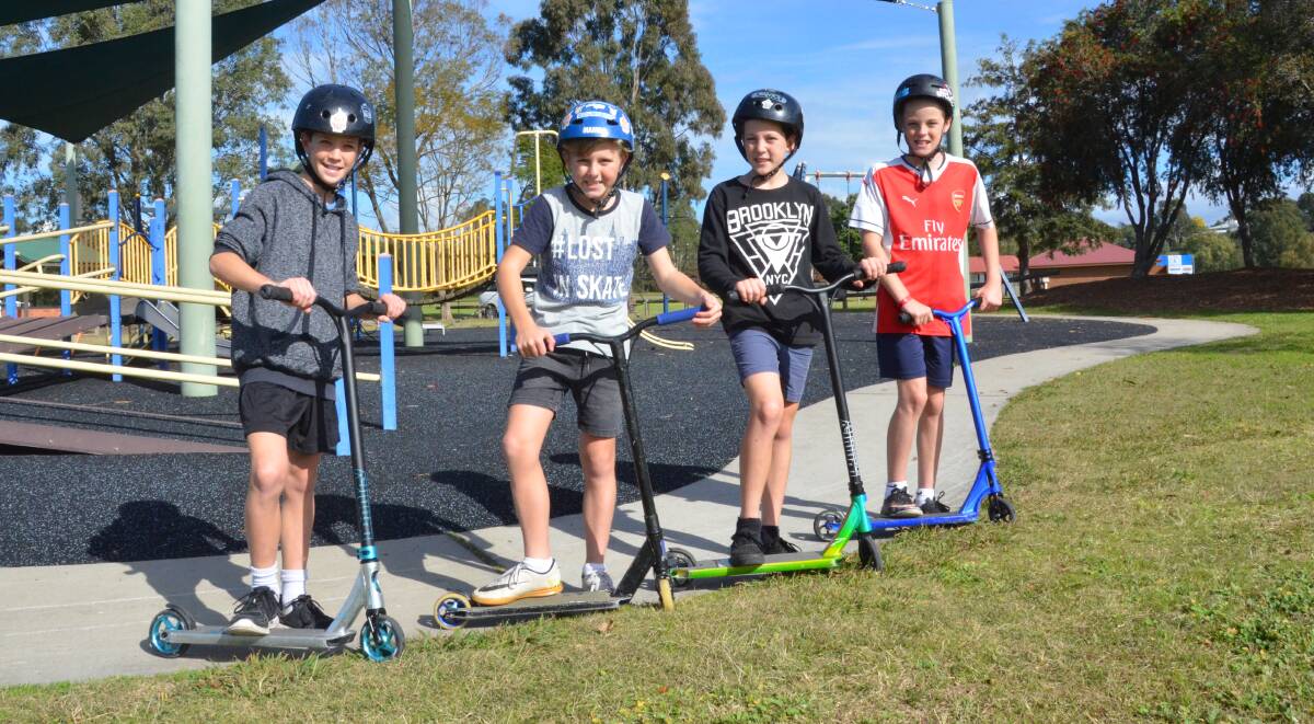 RECREATION: Dalton Miller (12), Sam Hamilton (11), Darcy Miller (12) and Jye Thorpe (11) would like to see better facilities for scooter and BMX riders in Branxton. Picture: Krystal Sellars