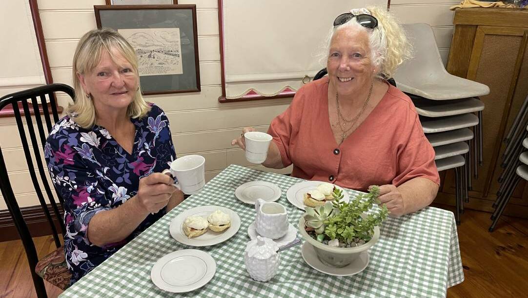 GOOD COMPANY: Cessnock Rotary Club members Vicki Steep and Carol Hale enjoy a cup of tea and a scone at Marthaville. Picture by Krystal Sellars