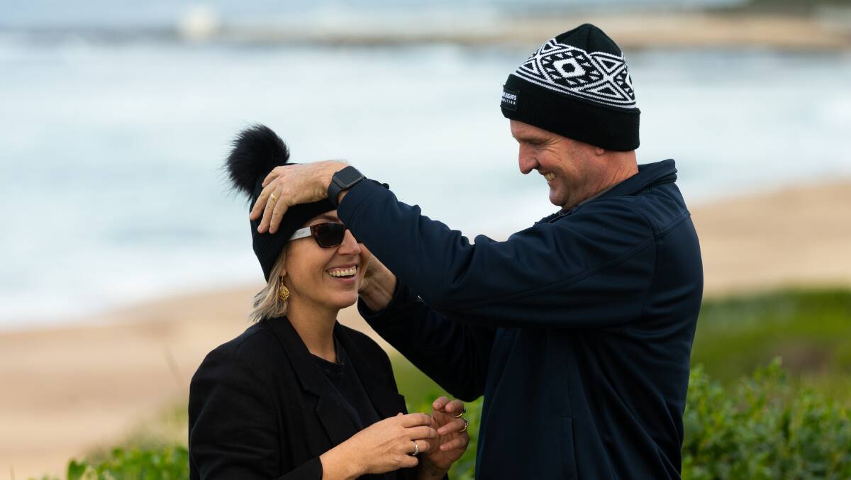 Mark and Kirralee Hughes from the Mark Hughes Foundation model this year's MHF Beanies for Brain Cancer. Picture by Jonathan Carroll