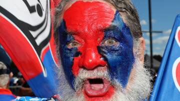 Paul Carter has been painting his face in Knights colours for more than a decade. Picture by Peter Lorimer