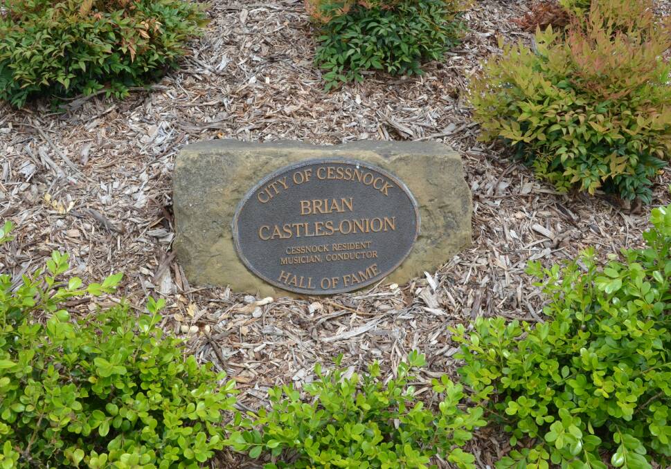 HONOUR: Brian Castles-Onion's Cessnock City Hall of Fame plaque in the garden near Cessnock Performing Arts Centre.