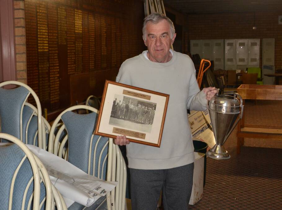 EVERYTHING MUST GO: Cessnock Golf Club captain Peter Conroy with some examples of what's on sale at the club's garage sale on Sunday, August 6. Picture: Krystal Sellars