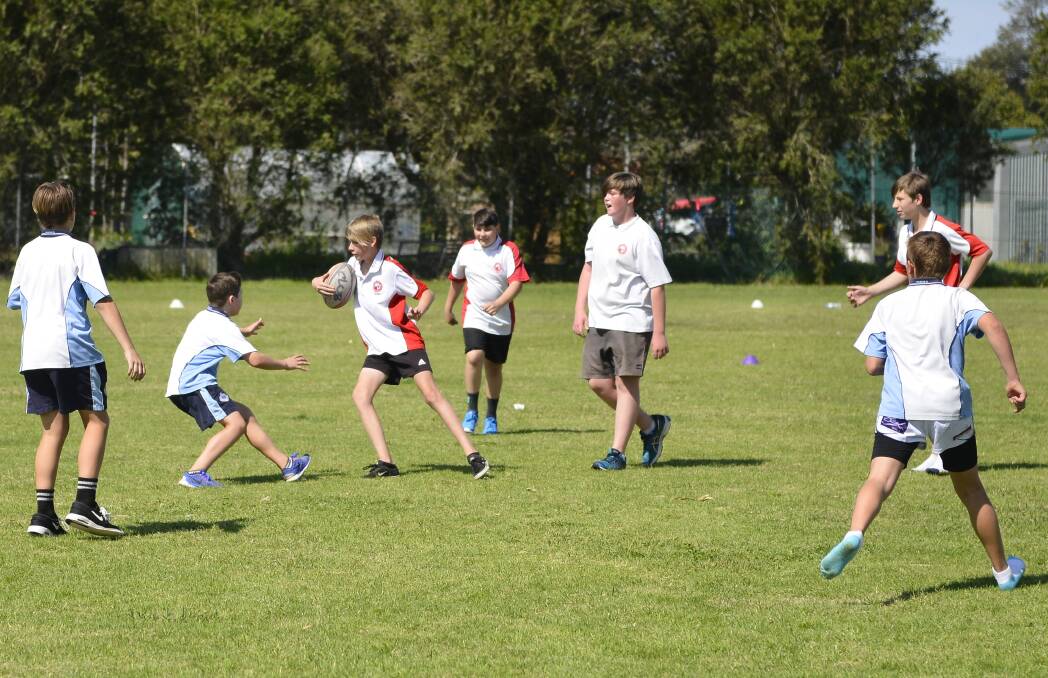 The Mount View High School year seven rugby league team playing Maitland Grossmann at the gala day on Friday.