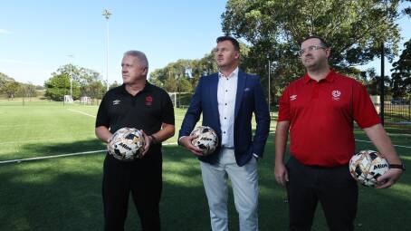 Northern NSW Football chief Peter Haynes, centre, with general manager referee growth and development Brad Carlin, left, and general manager football operations Liam Bentley on Wednesday. Picture by Simone De Peak